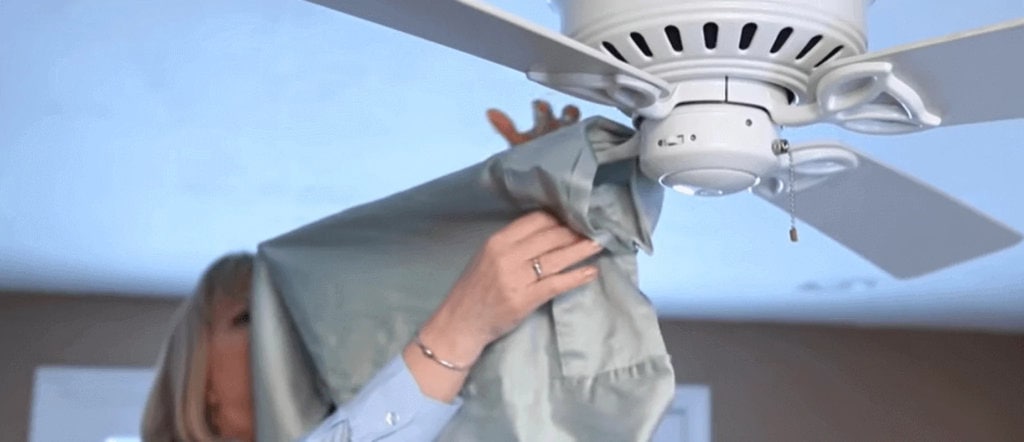 Using a pillowcase as a fan duster