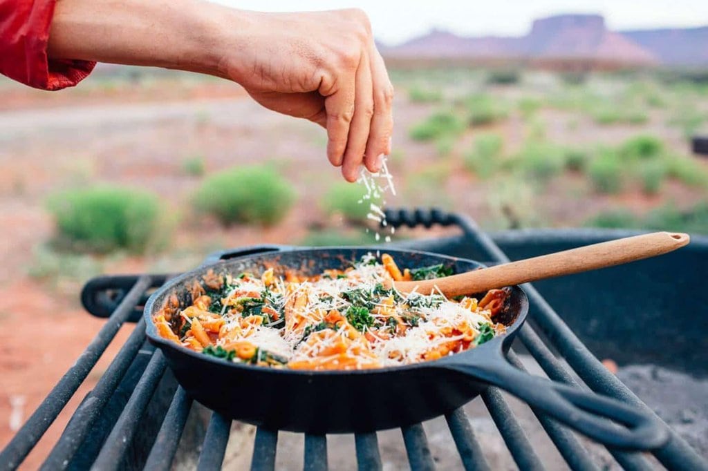 cooking in a grilling skillet outdoors